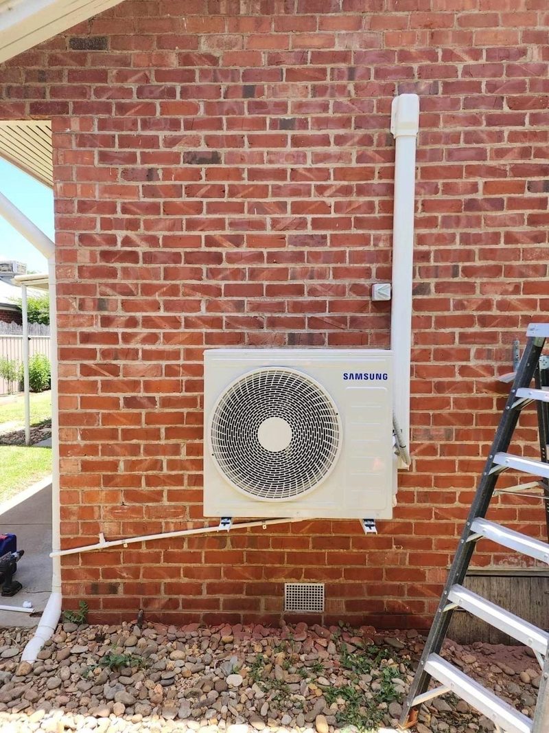 Split system air conditioner installed on a brick home in Mildura