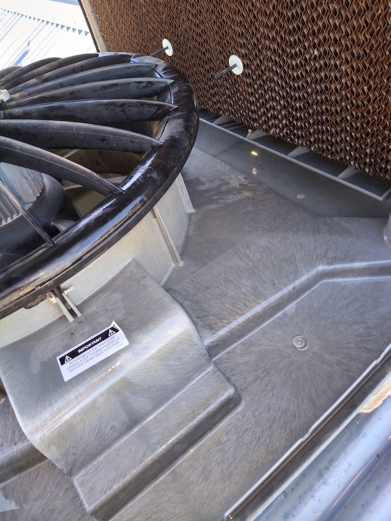 Evaporative cooler opened up for service