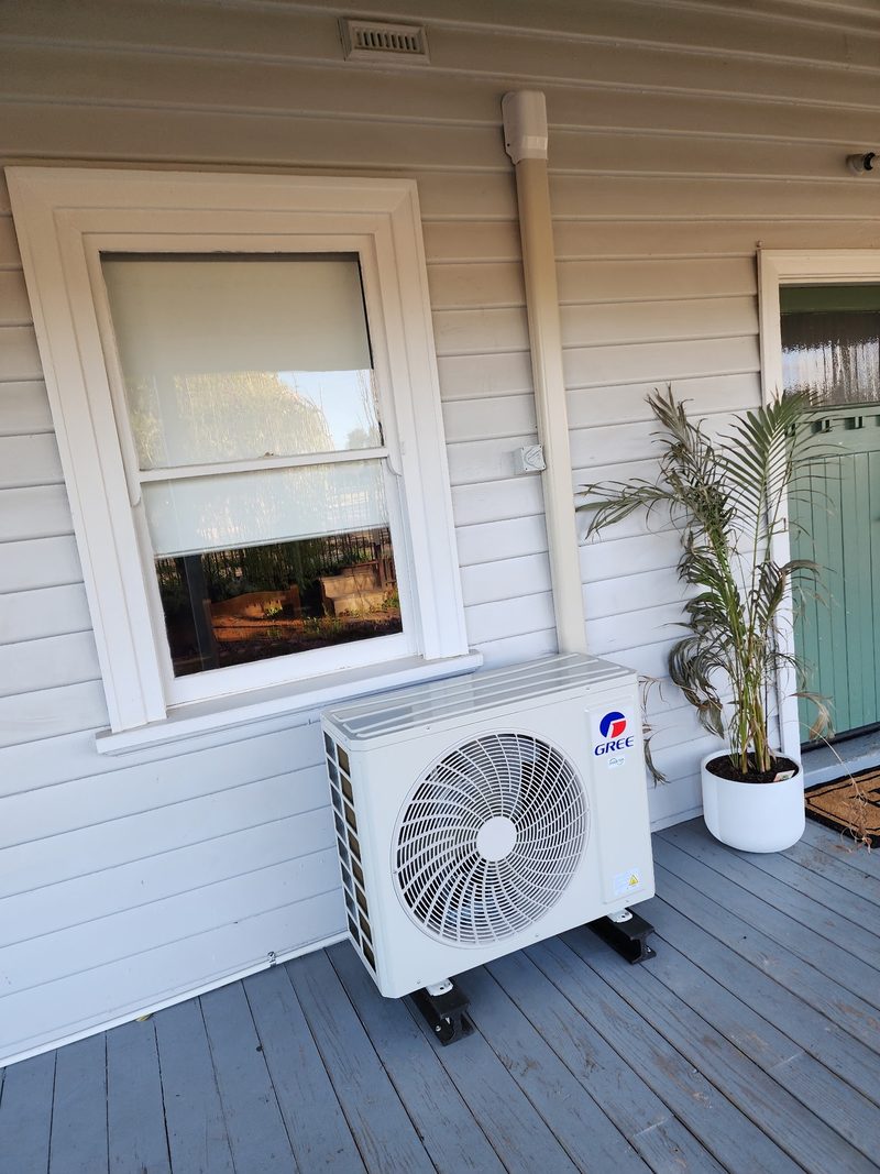 Split system on a weatherboard deck